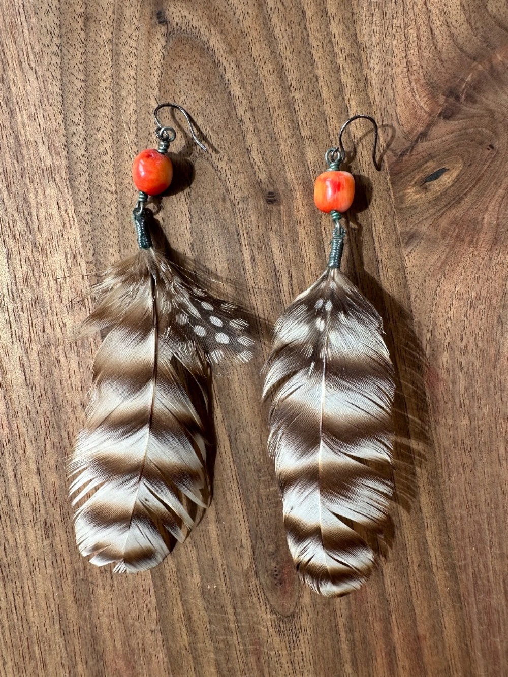 Feather Earrings with red bead